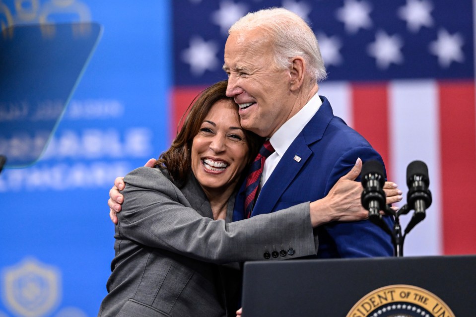President Biden and Vice President Harris embracing.