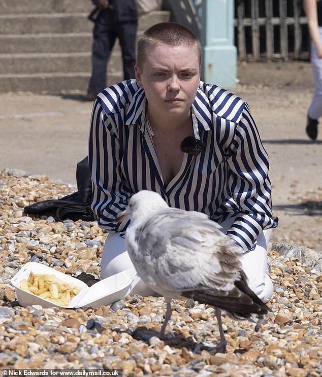MailOnline reporter Elizabeth Haigh tests out Dr Boogert's advice by staring down hungry seagulls