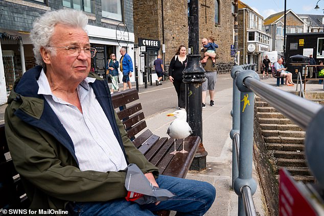 Tom Lowry, 74, had food stolen within minutes of MailOnline arriving in St Ives, Cornwall