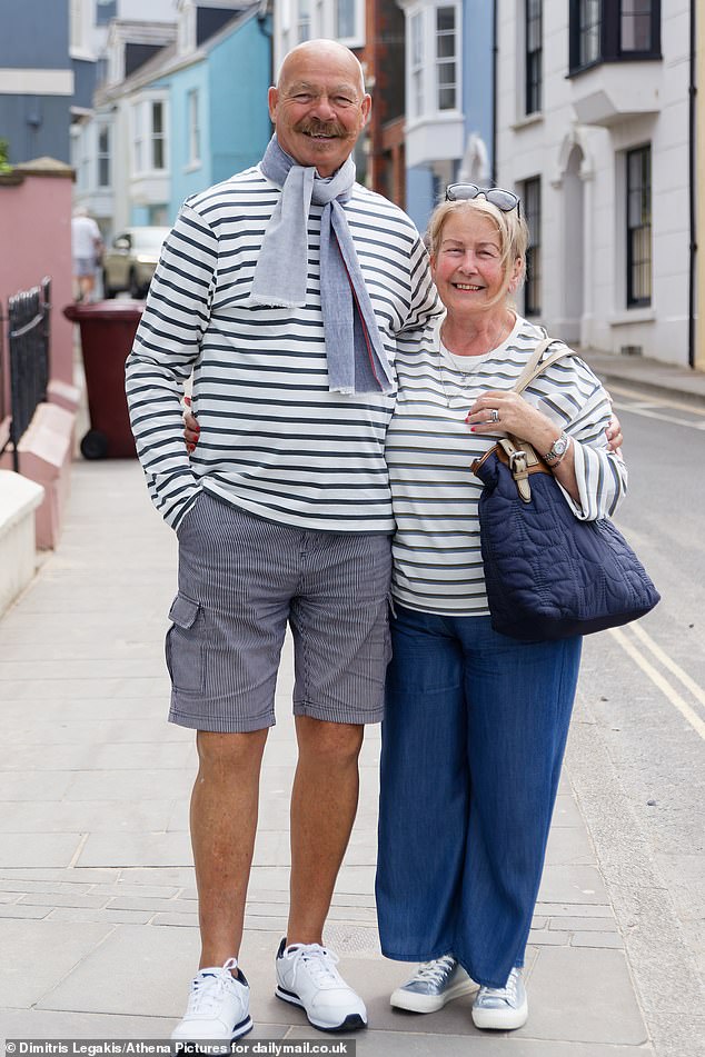 Retired butcher Dave Jenkins, 72, and his wife Marilyn, 71, from Bridgend, were co-incidentally in stripes on a day trip to Tenby