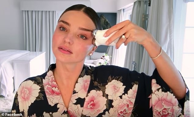 The NuFace Trinity microcurrent device is a firm favourite of Miranda Kerr [pictured using the tool]
