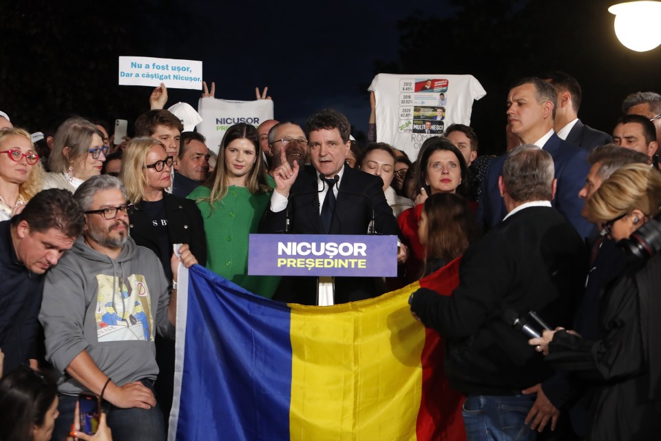 Nicusor Dan giving a speech after Romanian presidential election exit polls.