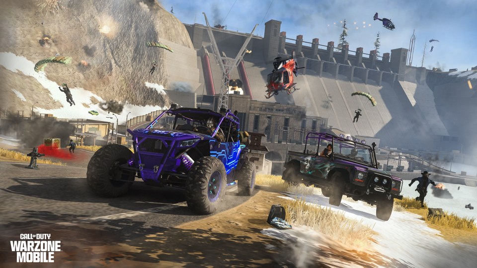 Call of Duty Warzone Mobile gameplay featuring vehicles and players near a dam.