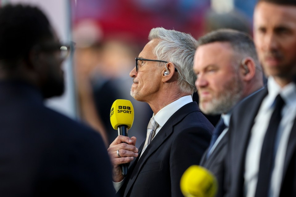 Gary Lineker holding a BBC Sport microphone.