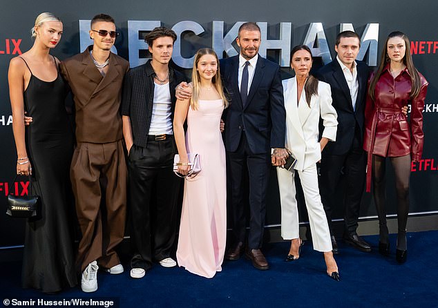 Pictured L-R: Mia Regan, Romeo Beckham, Cruz Beckham, Harper Beckham, David Beckham, Victoria Beckham, Brooklyn Beckham and Nicola Peltz attend the premiere of Beckham for Netflix in 2023