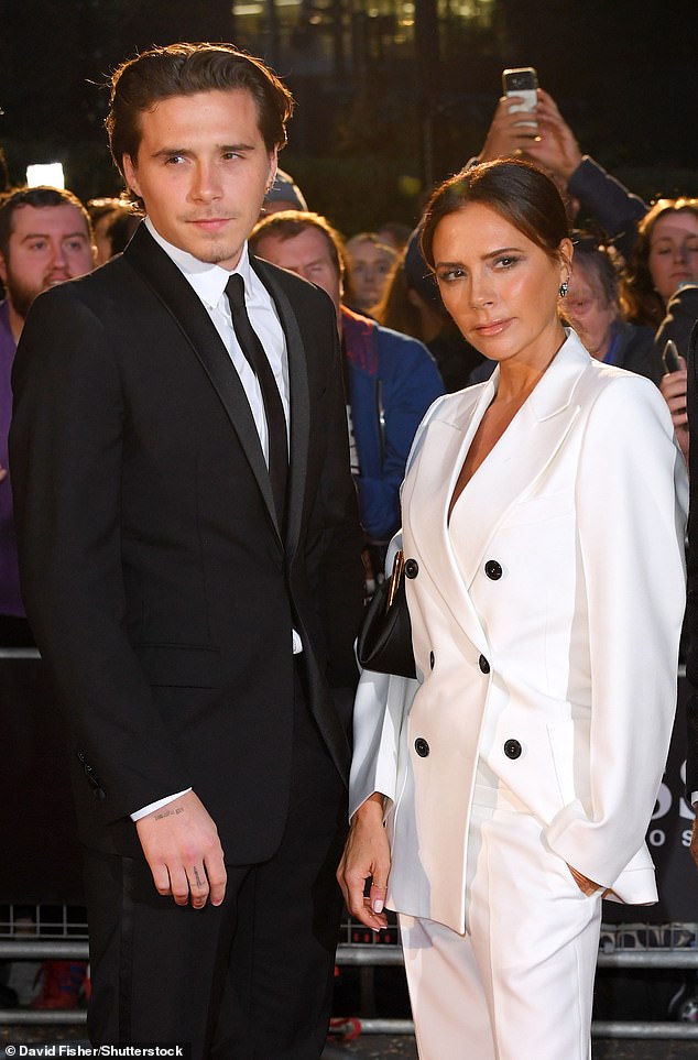 Brooklyn Beckham is snapped with his mother Victoria Beckham at the Tate Modern in 2019 - around the same time he started dating Nicola