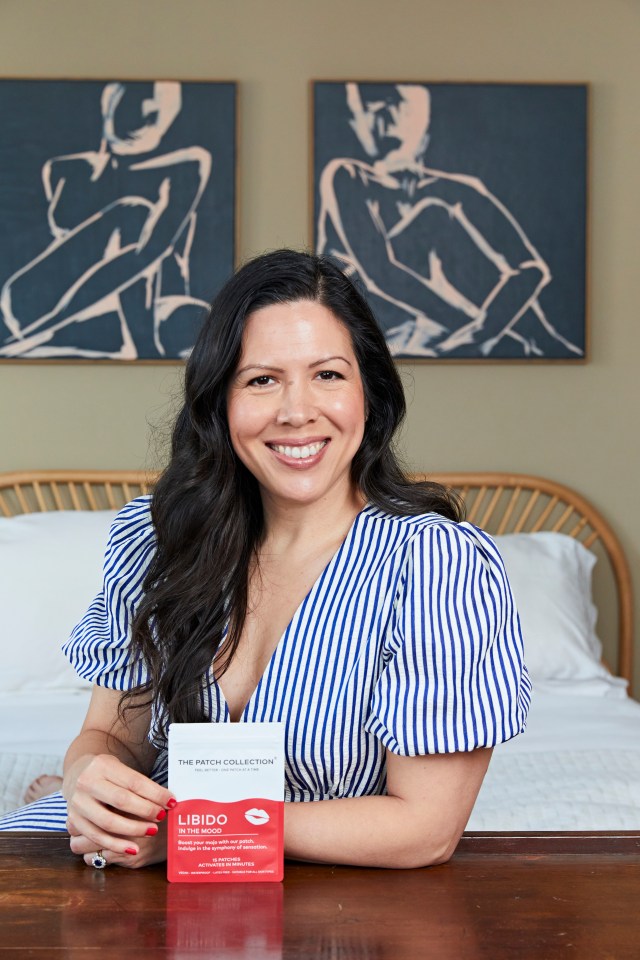 Woman holding libido patches.