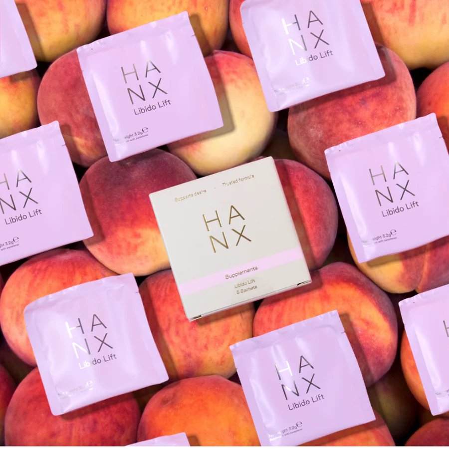 HANX Libido Lift supplements surrounded by peaches.