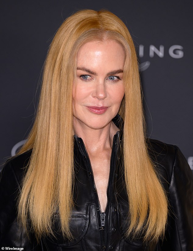 The hair gaffe was Nicole's second mishap of the day after her hair piece appeared slightly off-centre to her natural scalp line when she sported an all-black ensemble