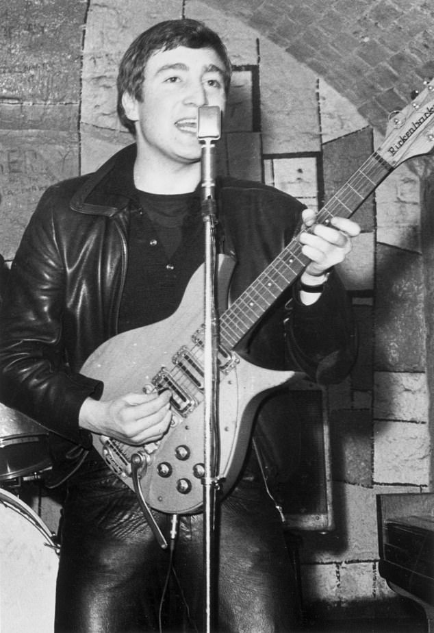 John Lennon wearing full leather as he performs at the Cavern Club, Liverpool, in 1961