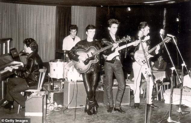 The Beatles' residency in Hamburg lasted from 1960 until 1962. Above left to right: McCartney, original drummer Pete Best, bassist Stuart Sutcliffe, lead guitarist George Harrison and Lennon in Hamburg in 1960