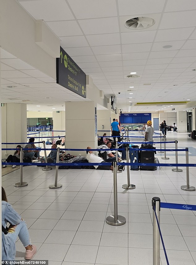 Photos from inside Rhodes airport shared on social media showed dozens of exhausted passengers sitting on the floor as they faced flight cancellations