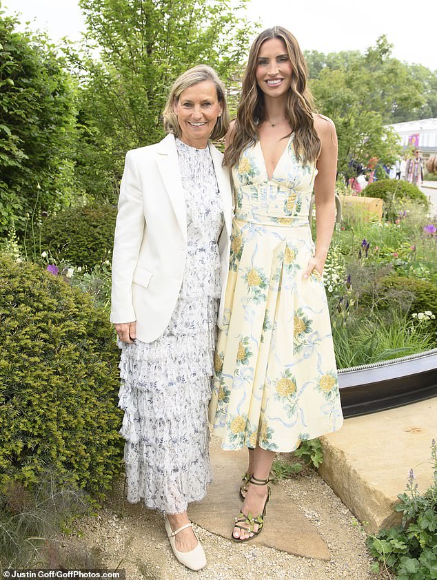 Ferne looked in good spirits as she posed alongside mother Gilly, who donned a chic tiered dress with a white blazer
