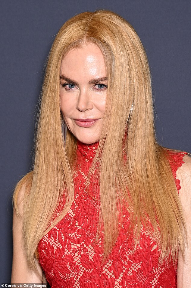 Nicole Kidman looked striking in a red gown in Cannes on Sunday - but she suffered a hair malfunction