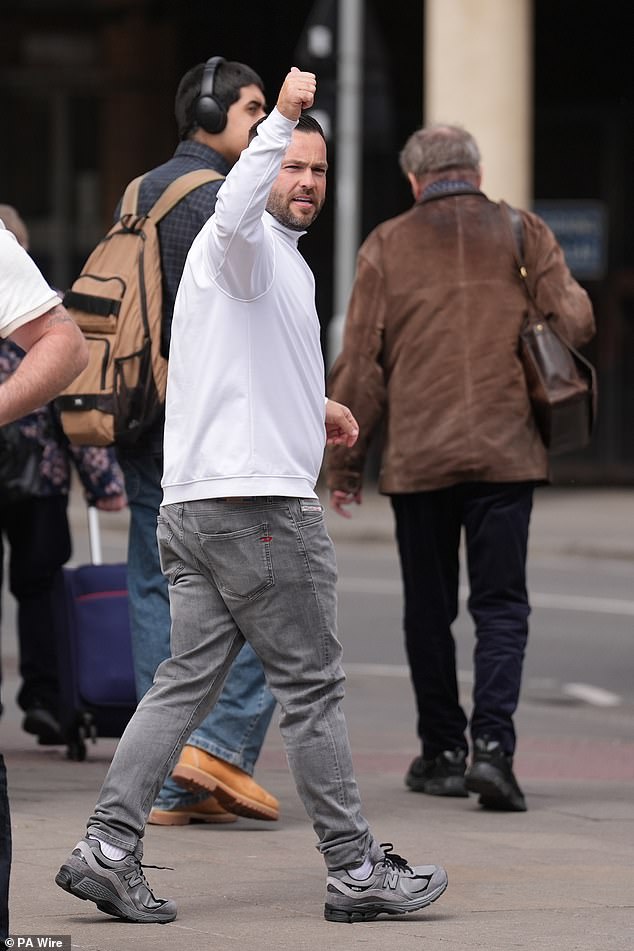 Doe leaving Oxford Crown Court after being sentenced to 21 months imprisonment suspended for two years
