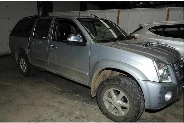 A silver pick-up truck used in the raid which was found abandoned nearby