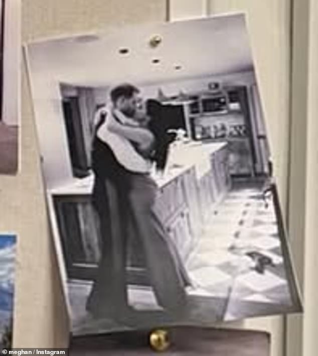 The couple stood kissing in the kitchen of Frogmore Cottage, which they renovated