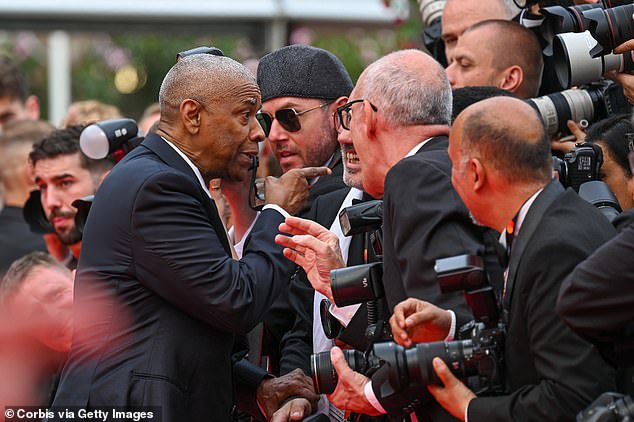 The iconic actor, 70, was filmed pointing his finger in the face of one of the snappers and shouting 'Stop it!' during the dramatic exchange which was captured on video