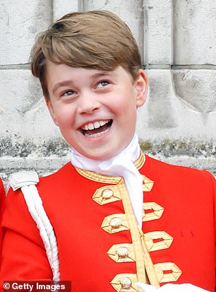Something funny, George? The young prince is pictured during an RAF flypast from the balcony of Buckingham Palace following the Coronation of King Charles