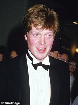 Earl Spencer is pictured with a cheeky smile on his face in the 1980s in London