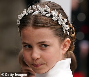 Snaps of Charlotte at the Coronation show her staring into the distance with her large green eyes. As she took it all in, many saw glimpses of Diana in her