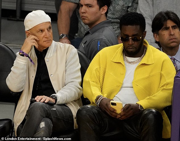 Richards said Interscope Records co-founder Jimmy Iovine, pictured with Diddy at a basketball game in 2023, was also present at the dinner