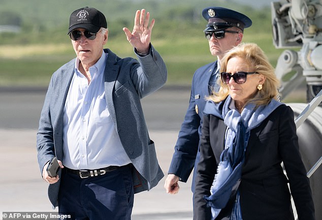 US President Joe Biden and First Lady Jill Biden disembark from Air Force One upon arrival at Henry E. Rohlsen Airport in Christiansted, St. Croix,