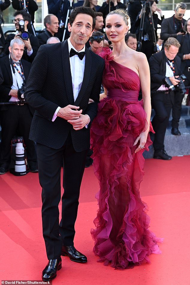 Leading the arrivals, Georgina Chapman also stepped out arm-in-arm with her partner Adrien Brody