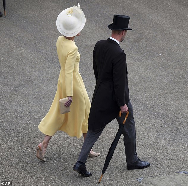 Britain's Prince William and Kate, the Princess of Wales, appeared perfectly in sync this afternoon