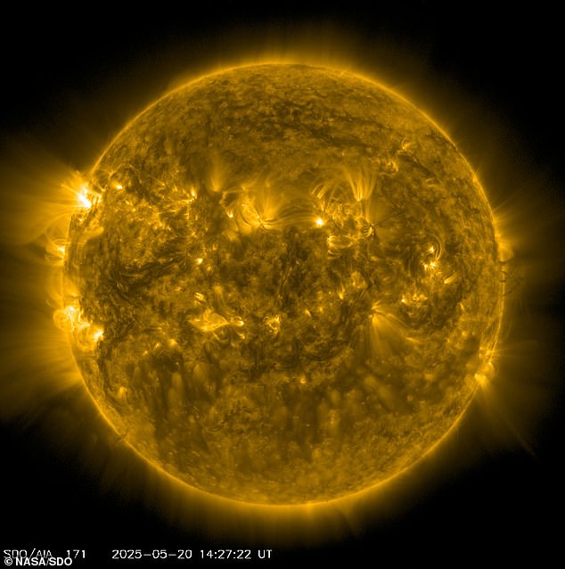 An active region at the edge of the Sun and a coronal mass ejection