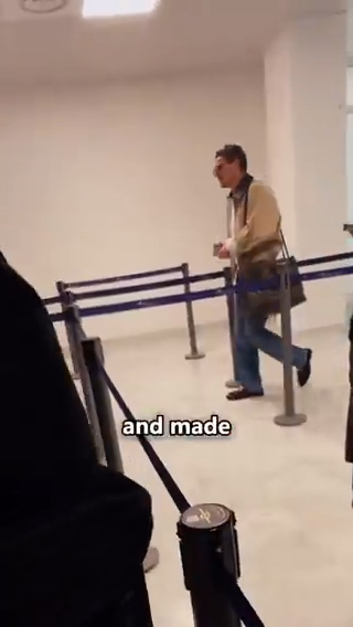 Pedro Pascal walking through an airport.