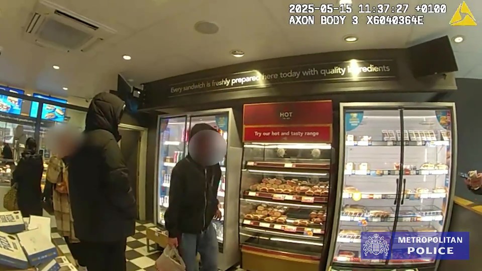 Surveillance image of shoplifters in a store.