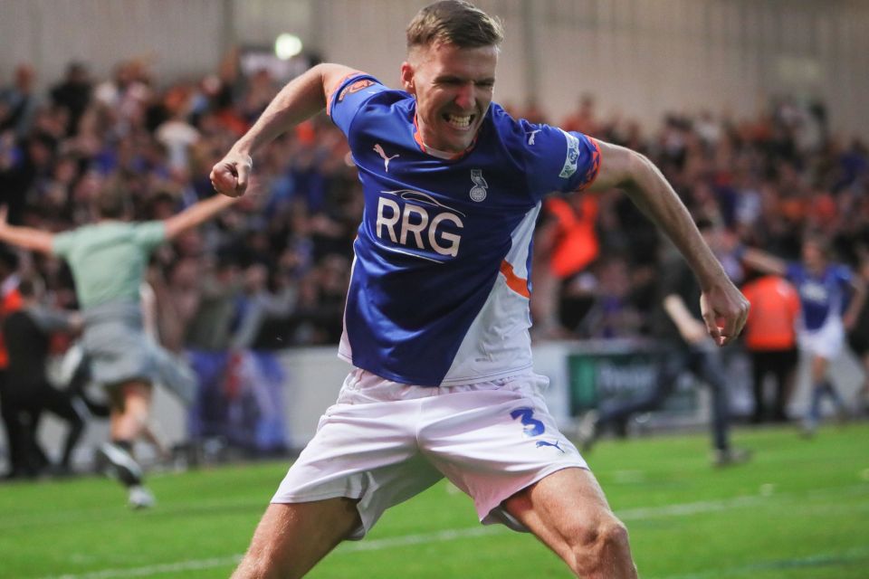 Mark Kitching of Oldham Athletic celebrating a goal.