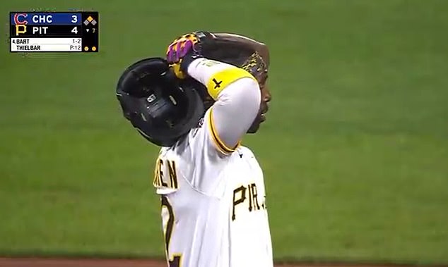 Pirates player Andrew McCutchen put his head in his hands after the shocking moment