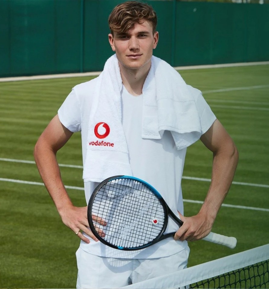 Jack Draper, Vodafone tennis ambassador, on a tennis court.