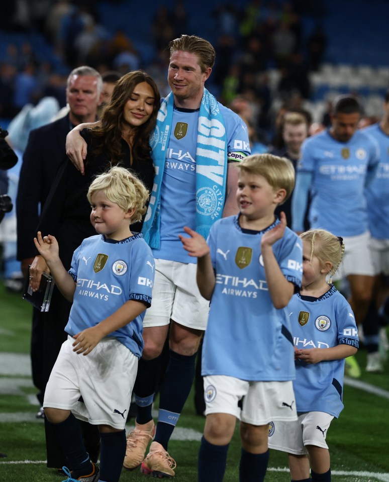 Kevin De Bruyne with his family after a soccer match.