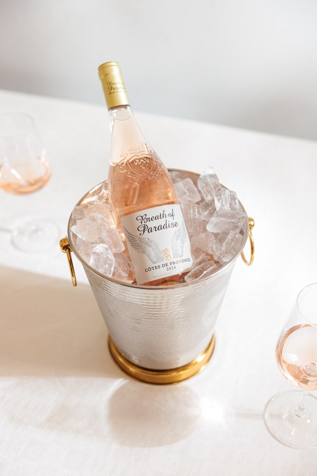 Bottle of Breath of Paradise rosé wine in an ice bucket.