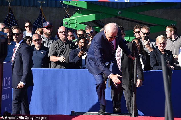 Questions have been raised about Biden's cognitive decline during his stint in the White House. Pictured falling onto stage in Pennsylvania in 2023