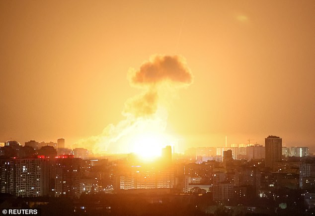 An explosion of a ballistic missile lights up the sky over the city during a Russian missile and drone strike, amid Russia's attack on Ukraine, in Kyiv, Ukraine, April 24, 2025
