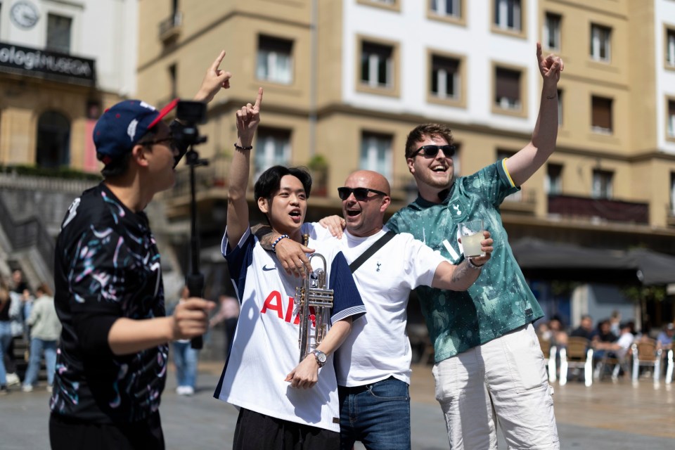 BILBAO, SPAIN - MAY 20: Tottenham Hotspur fan Jangwon Son plays the trumpet ahead of the UEFA Europa League Final 2025 between Tottenham Hotspur and Manchester United at Nueva Plaza on May 20, 2025 in Bilbao, Spain (Photo by Ryan Pierse/Getty Images)