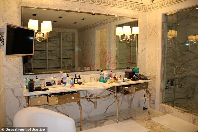 Diddy's luxurious marbled bathroom mirror was scrawled with strange and gushing messages written in marker and lipstick