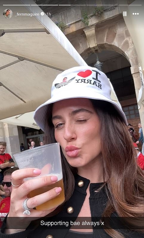 She posted another image while she sported an Adidas bucket hat while holding a beer