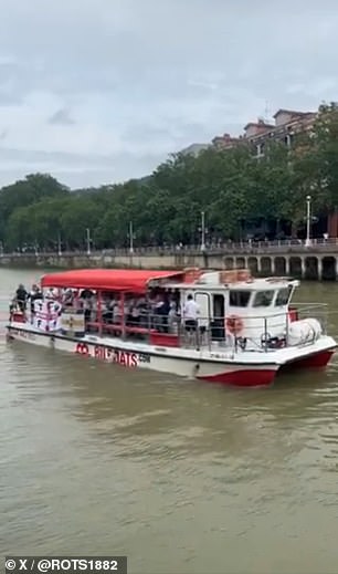 Several Tottenham fans were seen on a boat in the build-up to the crunch clash tonight