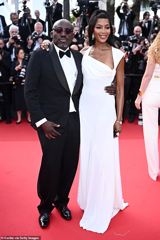 Edward cut a dapper figure in a black tuxedo, which he paired with a pair of patent suit shoes