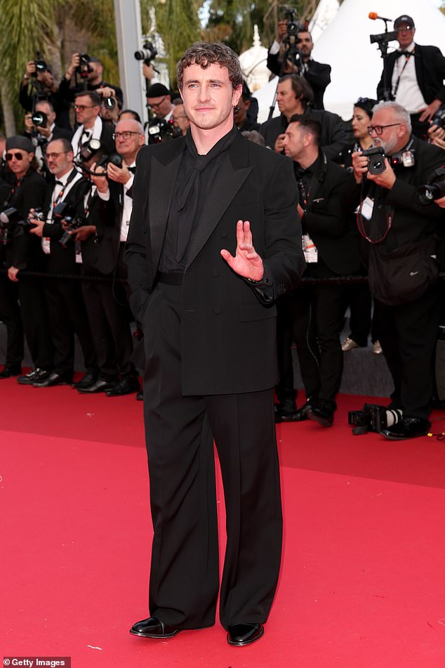 Irish actor Paul cut a dapper figure in an all-black suit, made up of a shirt with a neckerchief, a blazer with silk lapels and smart tailored trousers