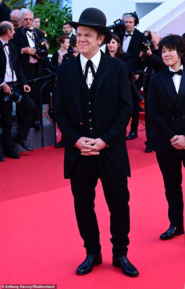 John C. Reilly cut a dapper figure in a unique black suit, which he styled with a bowler hat