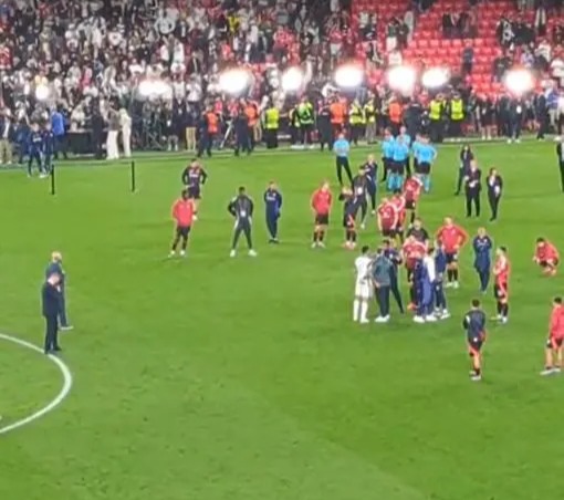 Soccer players on a field.