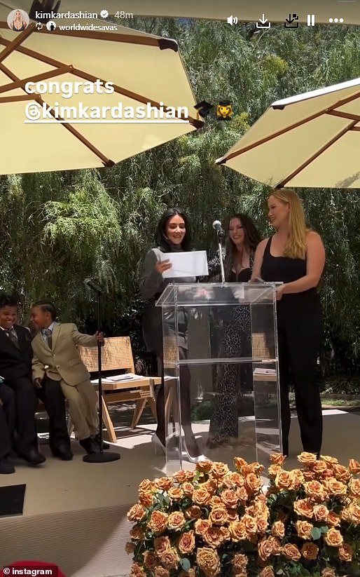 Kim received her diploma from her mentors, who raved about her achievements