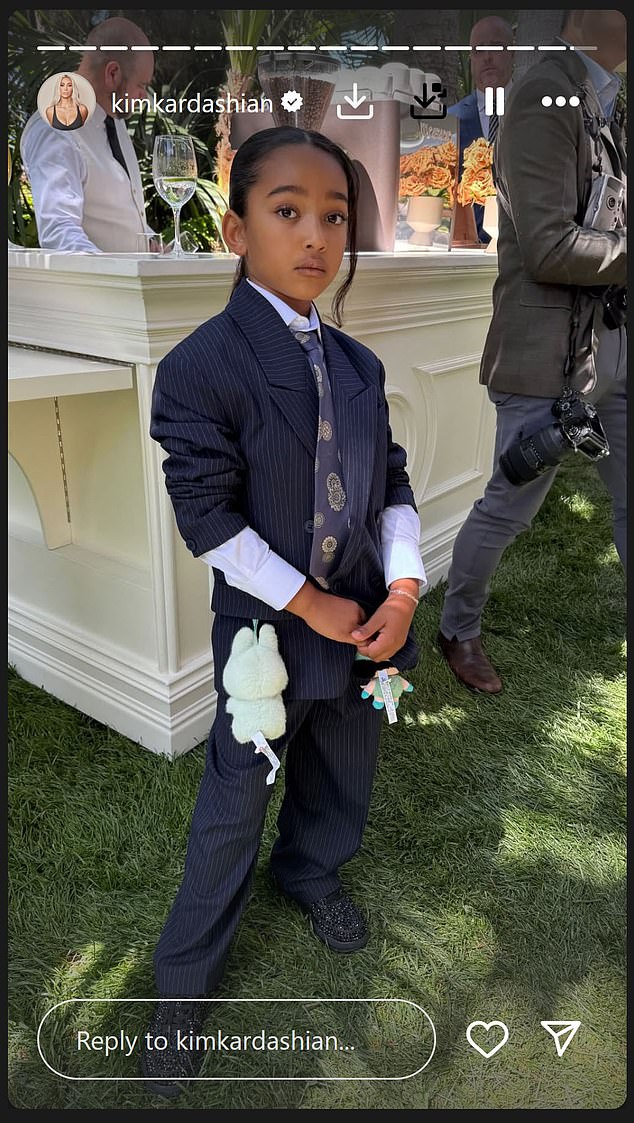 Daughter Chicago was also clad in a suit to watch her mom graduate