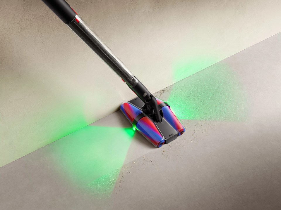 Vacuum cleaner cleaning a floor.